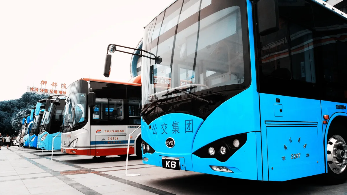 BYD electric vehicle assembly line with workers and robots